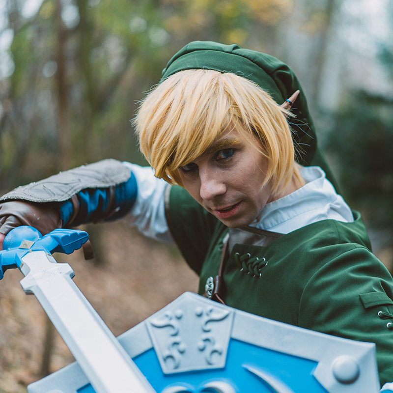A cosplayer in costume as Link from the Legend of Zelda.